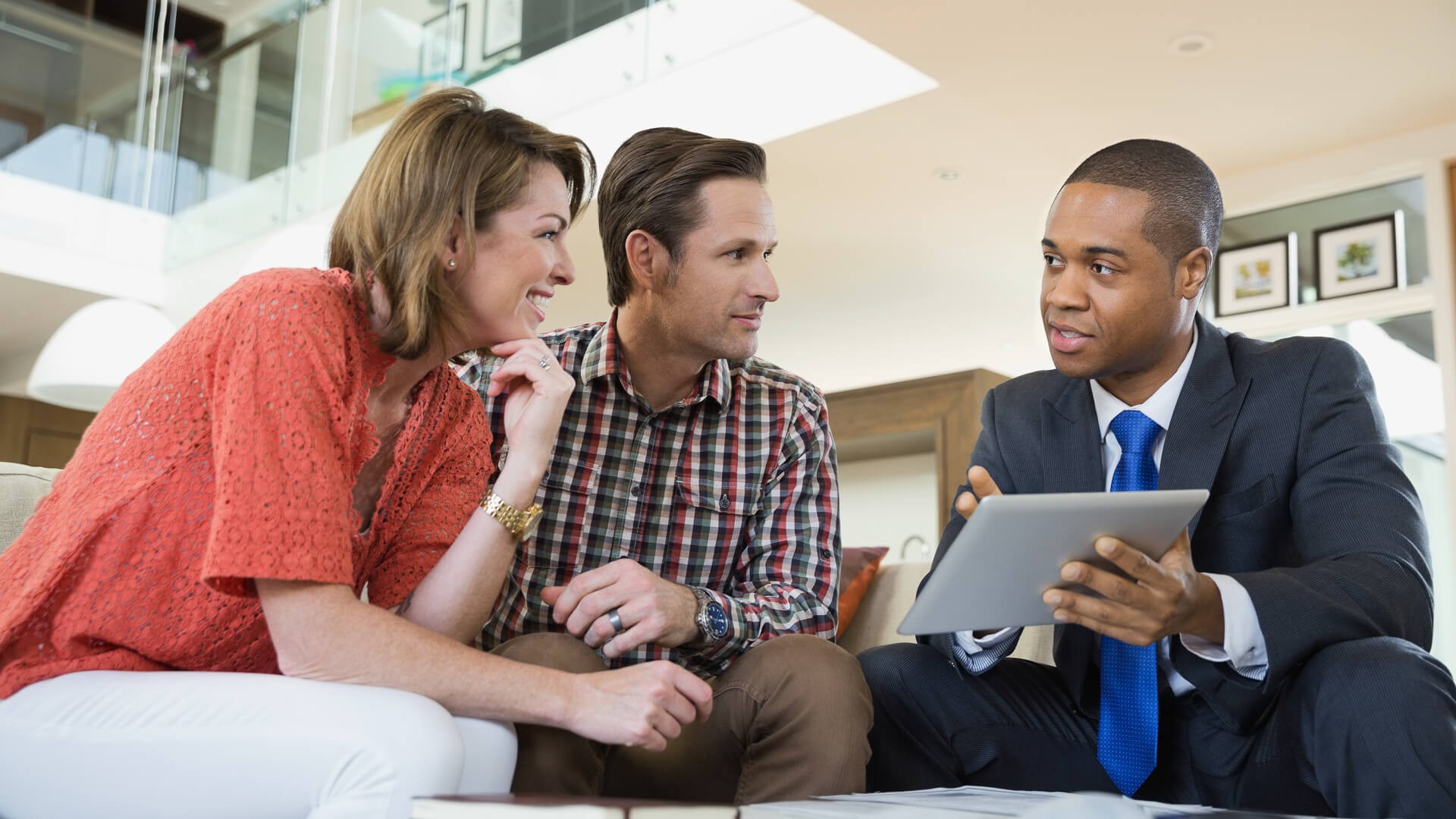 Gen Z Investing in Iowa: Real Estate or Stocks? Financial Advisors Weigh In